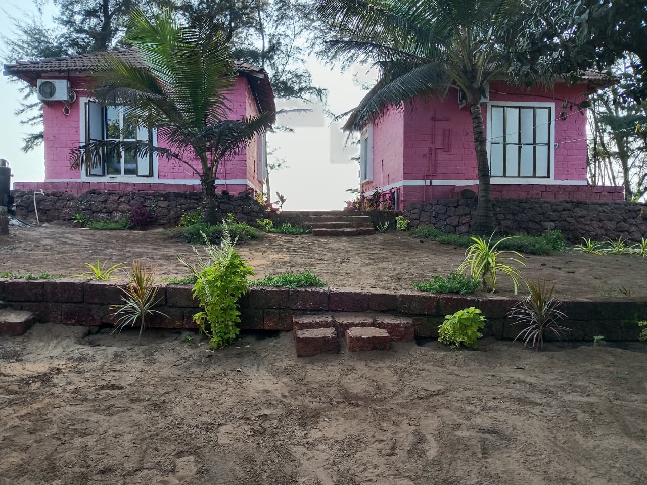 Warm evening view of The Red Stones Resort